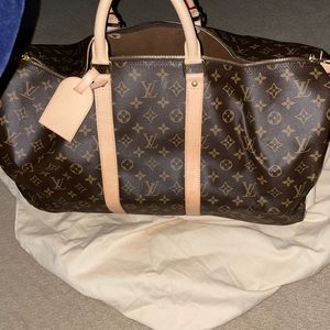 Brand new barely use Louis Vuitton duffle
